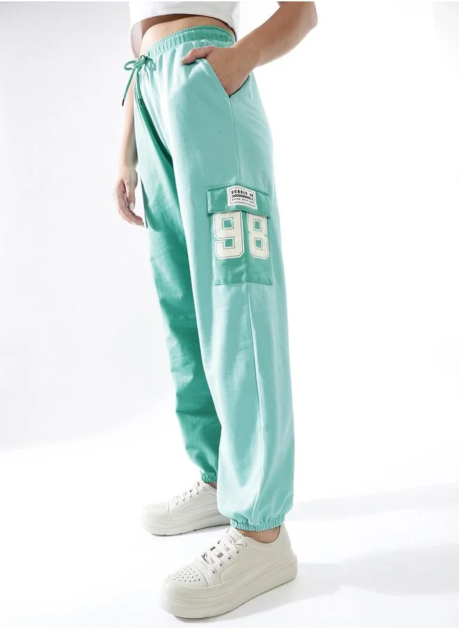 هوبرهولمي Women Track Pants in Multicolor featuring Jogger fit with a colourblocked pattern, no sleeves, regular length, secured with elasicated + drawstring closure, crafted from terry – perfect for elevating your everyday style.