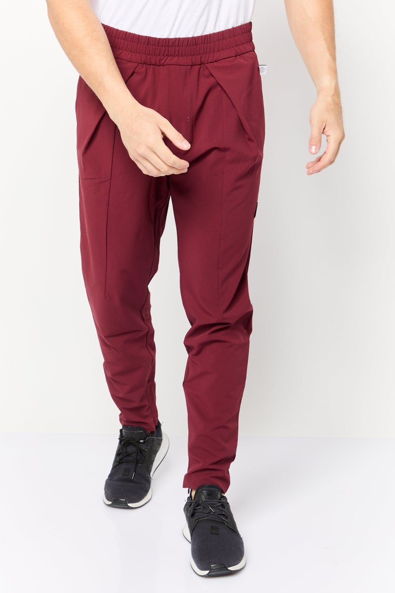 Adidas سروال رياضي للرجال بشعار العلامة التجارية مناسب للارتداء الخارجي، مارون - Image 1