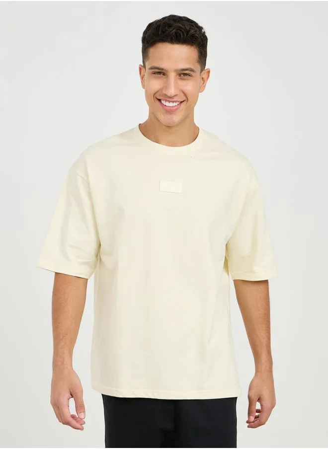 ستايلي Oversized Silicon Badge Detail Terry T-Shirt