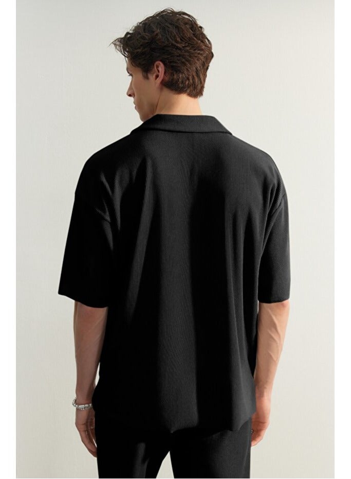 trendyol Limited Edition Black Oversize/Wide Fit Textured Anti-Wrinkle Polo Neck T-Shirt TMNSS23PO00020 - Image 2