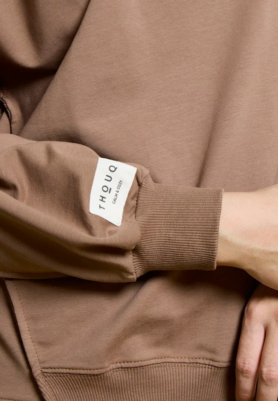 Thouq Asymmetric Hemline Extended Side Seam Sweatshirt