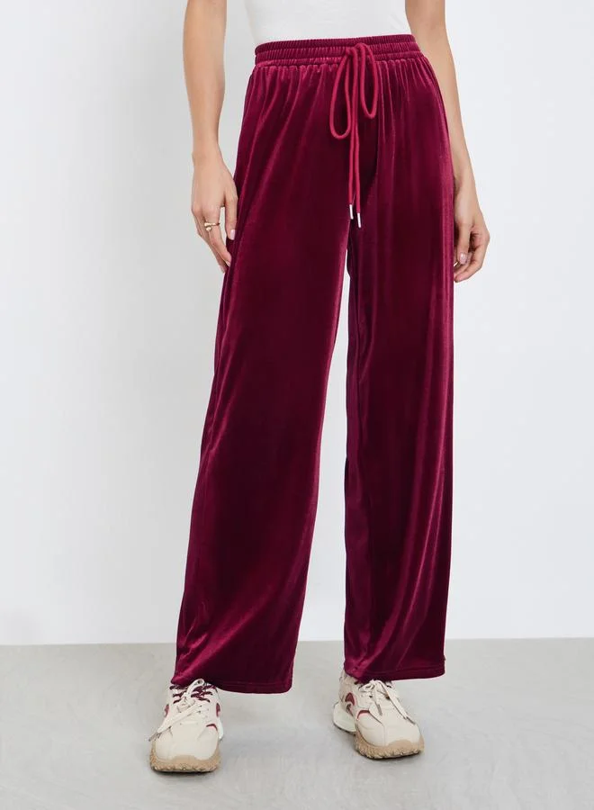 Styli Women Burgundy Plain Velvet Wide Leg Pants