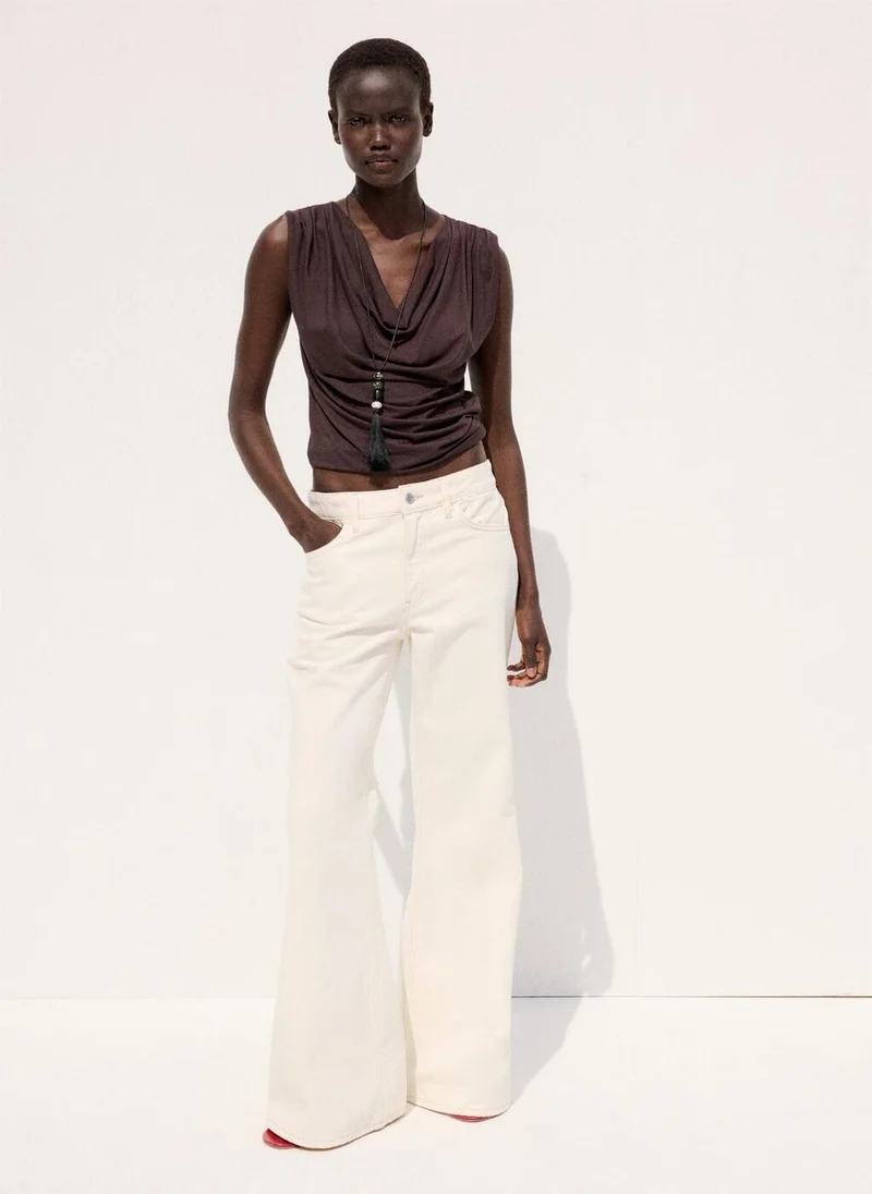 Mango  Mid-rise flared jeans for Women | Best Price UAE