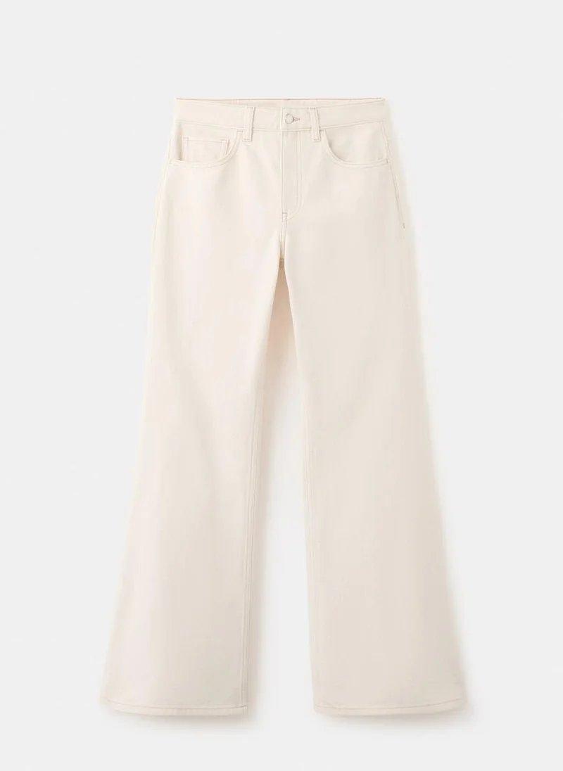 Mango  Mid-rise flared jeans for Women | Best Price UAE