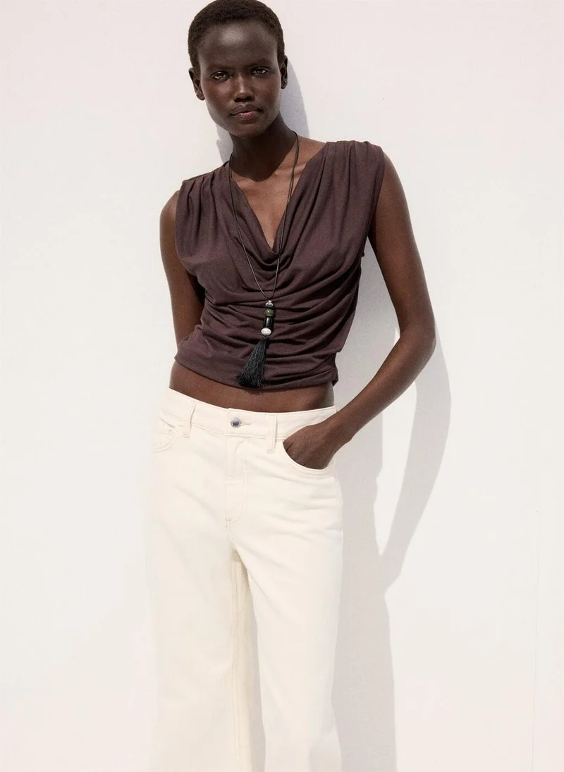 Mango  Mid-rise flared jeans for Women | Best Price UAE