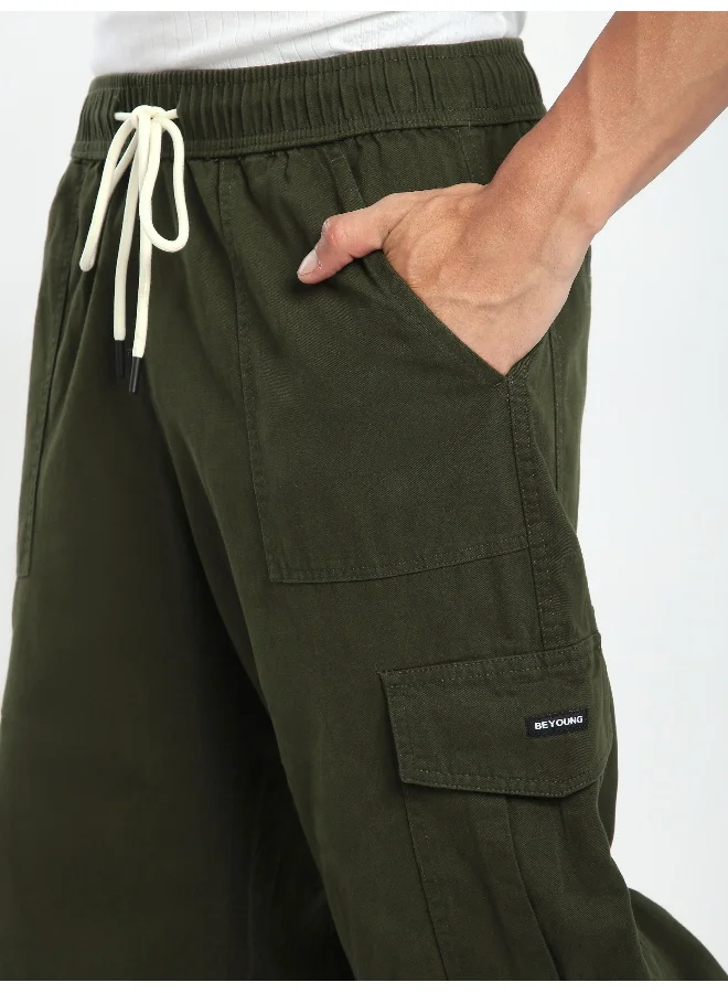 Beyoung Crocodile Green Zippered Cargo Pants