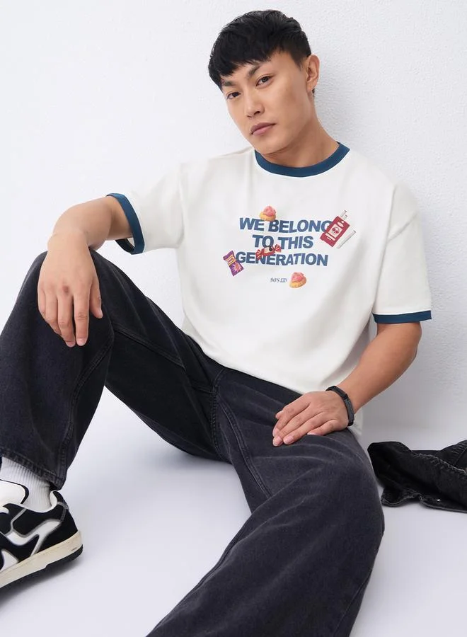 ذا سوليد ستور تيشيرت مطبع بقصة واسعة