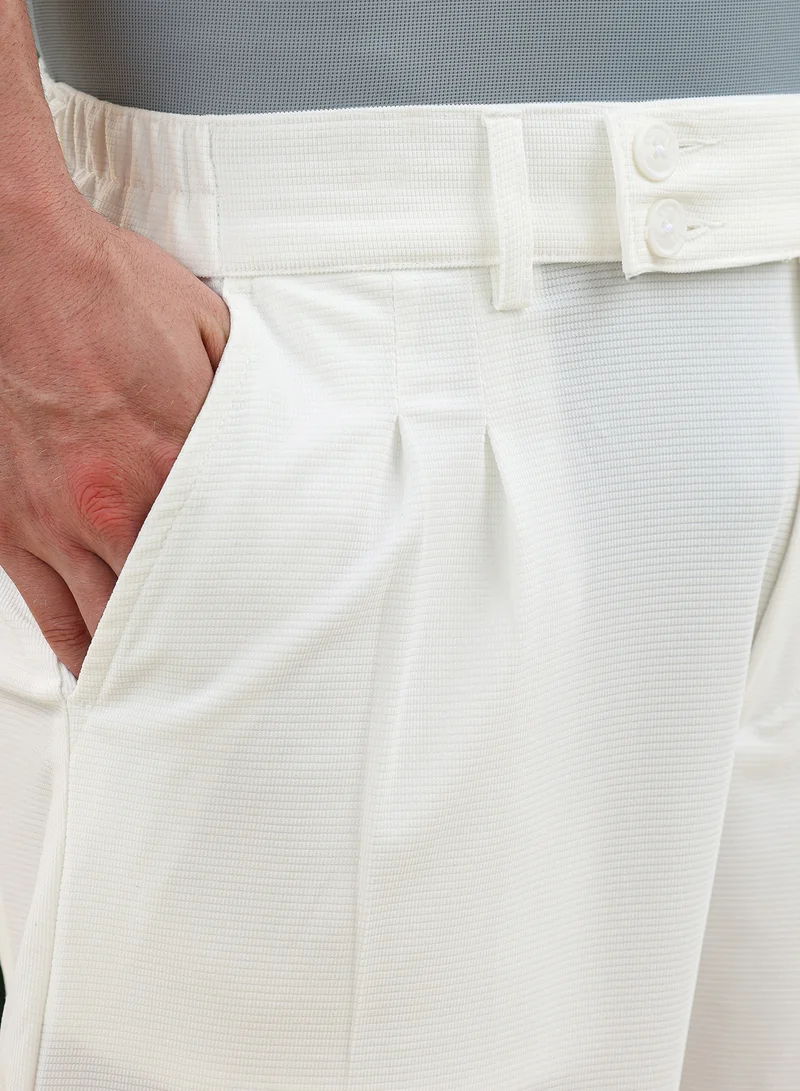CAHOOT  Men Pleated Cuffed Trousers | Mid-Rise, Side-Elasticaed Stretch | Extended-Button , Cuffed-Straight Hem | Solid Textured | Woven Fabric For Casual & Daily Wear | Chalk White for Men | Best Price UAE