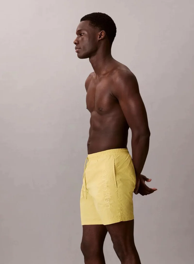 Calvin Klein Party Lime Medium Drawstring Swim Shorts - CK Tech for Men | Best Price UAE
