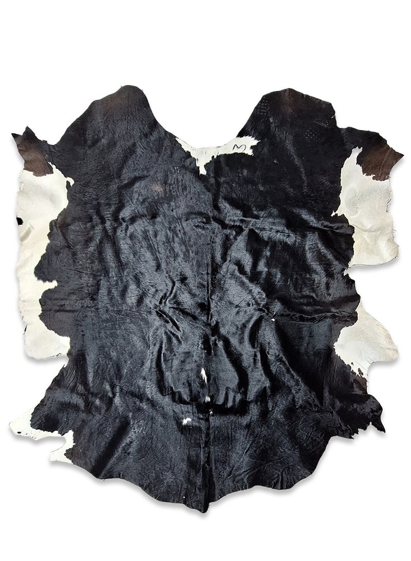 Natural Cowhide Carpet , Luxurious and elegant , ideal for use in living rooms, dining rooms, reception , and offices , a distinctive decorative piece made of natural calfskin with a non-slip backing - lightweight and adds a unique touch to any space  - Image 1