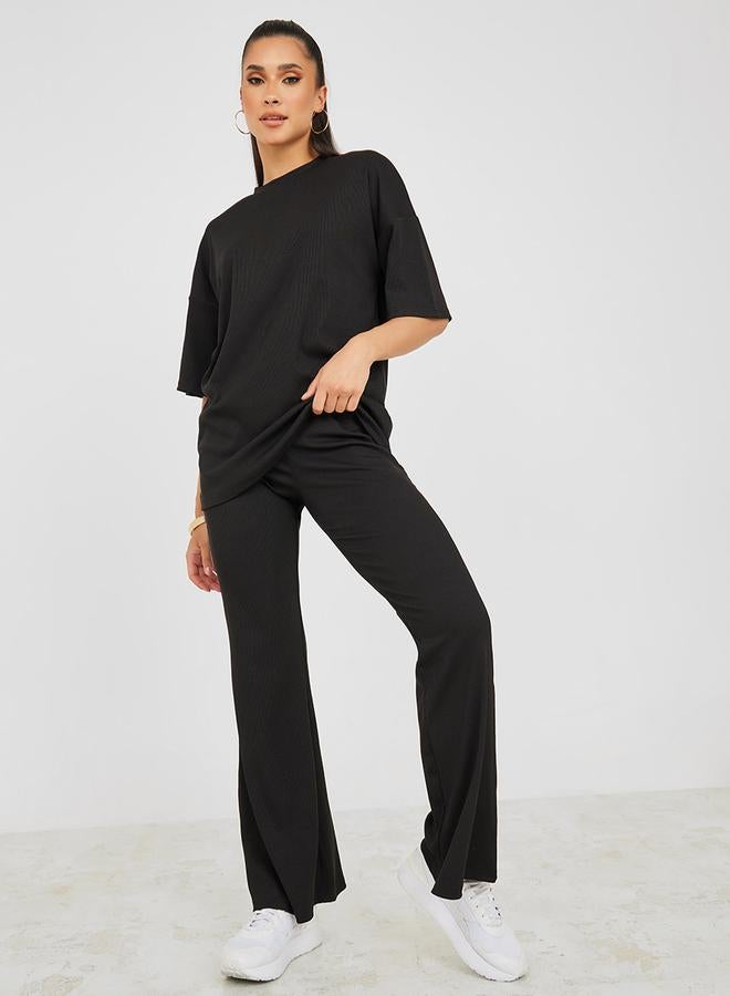 Styli Ribbed Oversized T-Shirt & Flared Trouser Co-Ord Set - Image 1