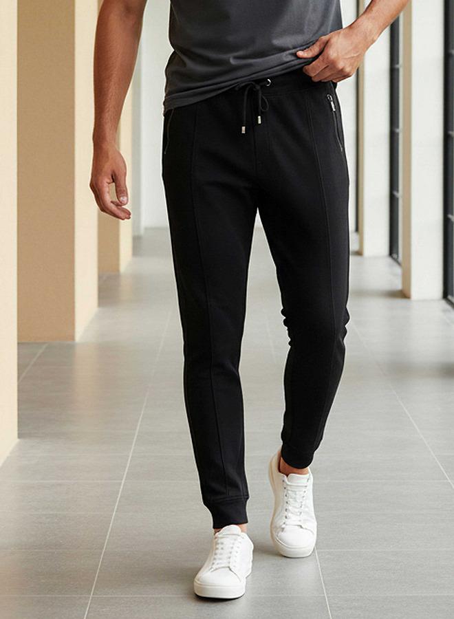 Iconic Solid Joggers with Drawstring Closure and Pockets - Image 1