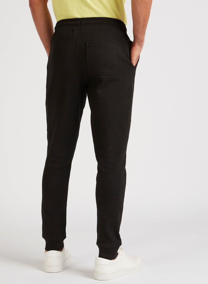 Iconic Solid Joggers with Drawstring Closure and Pockets - Image 4