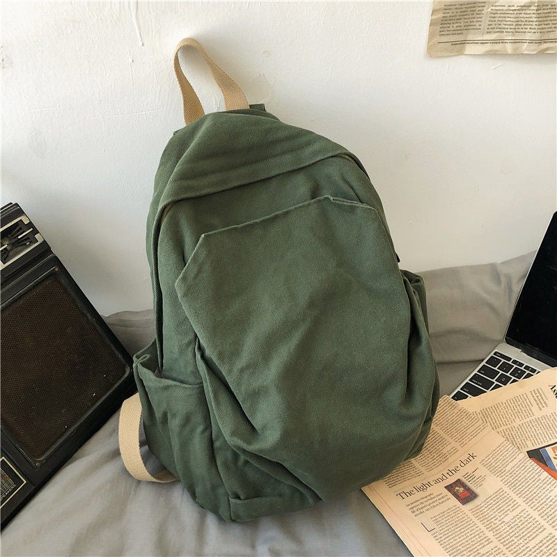 Japanese And Korean Casual Large-Capacity School Bag Forest Style Literary Youth Simple Pure Color Unprinted Canvas Backpack - Image 1