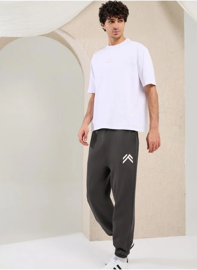 ستايلي Mid Rise Oversized Joggers with Minimal Print