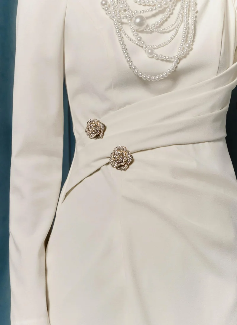 Lichi Maxi dress with draped waist and rhinestone brooch