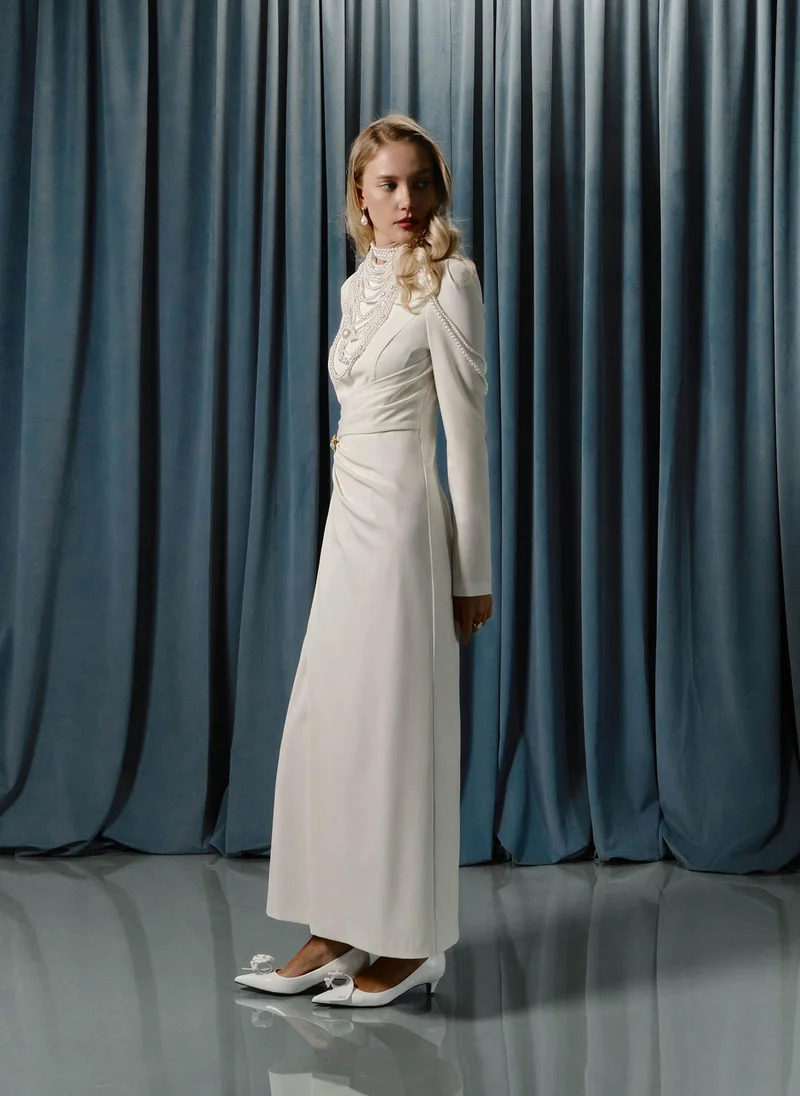 Lichi Maxi dress with draped waist and rhinestone brooch