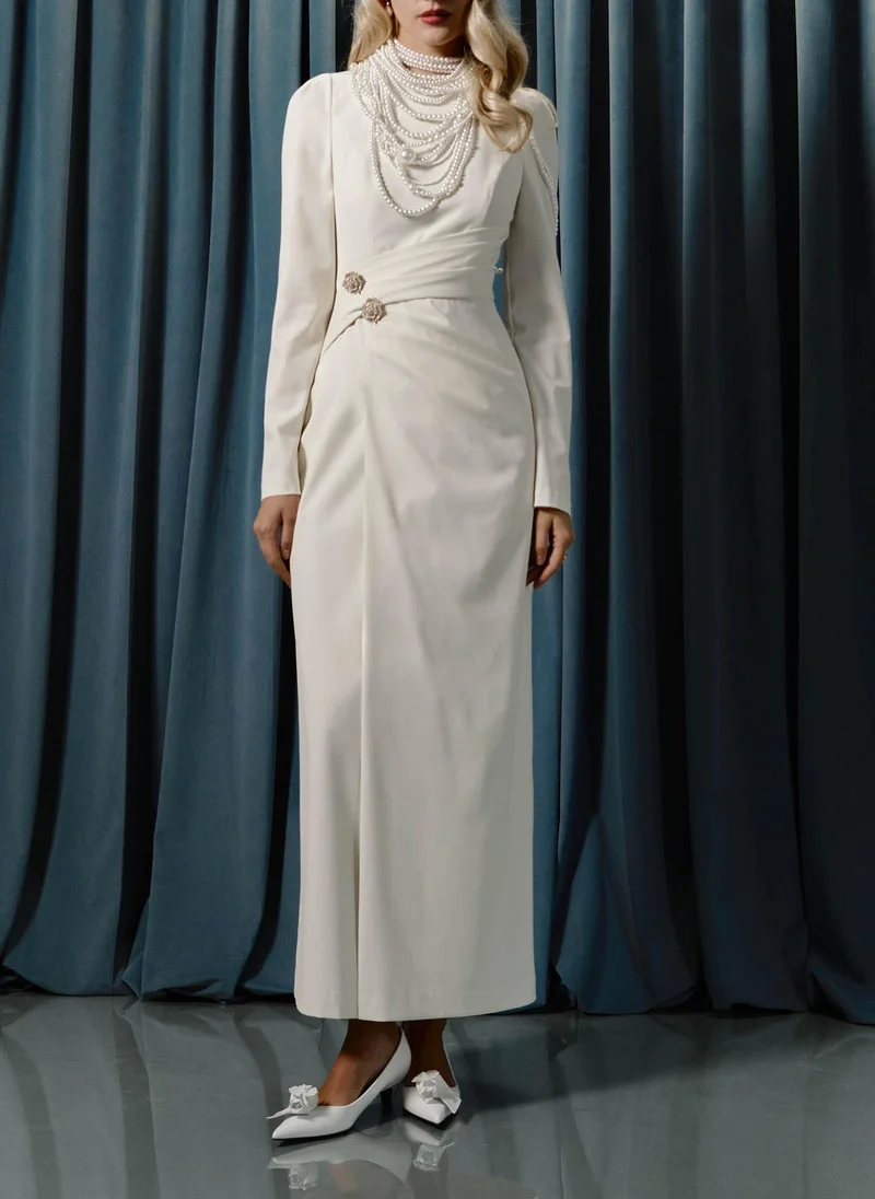 Lichi Maxi dress with draped waist and rhinestone brooch