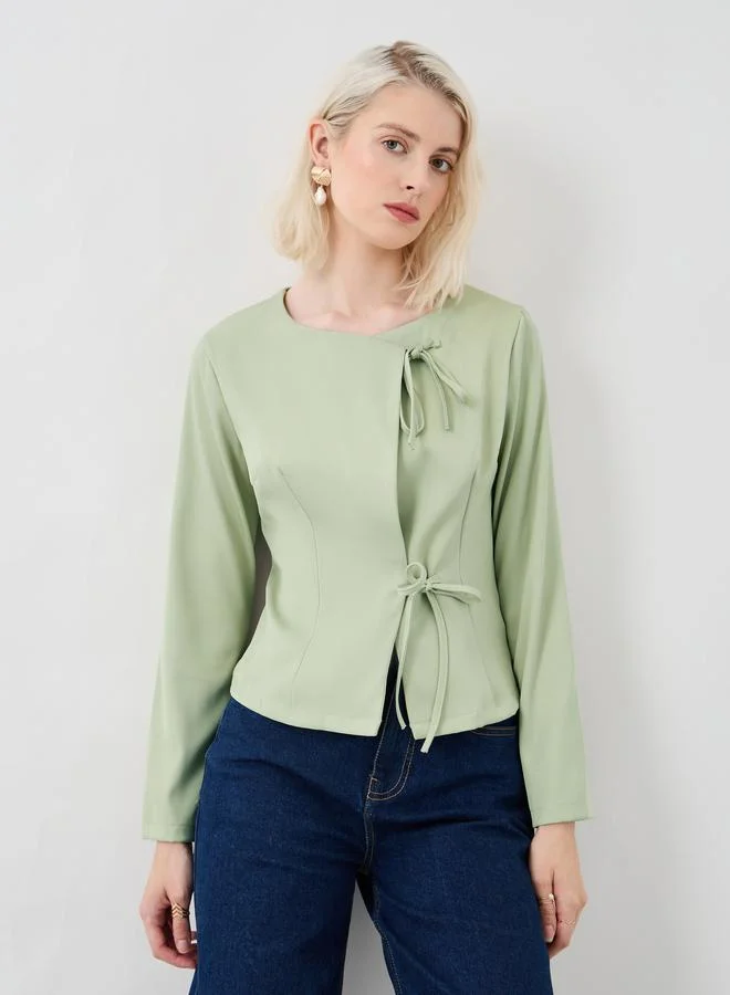 تايك تو بلوزة بأكمام طويلة سادة مع تفاصيل ربط