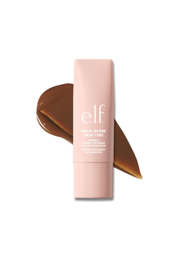 إلف e.l.f. Halo Glow Skin Tint SPF 50، مرطب ملون لتغطية خفيفة وقابلة للبناء، يمنح البشرة إشراقة طبيعية، نباتي ولم يُختبر على الحيوانات، درجة 17 Rich Warm، سعة 30 مل. - Image 1