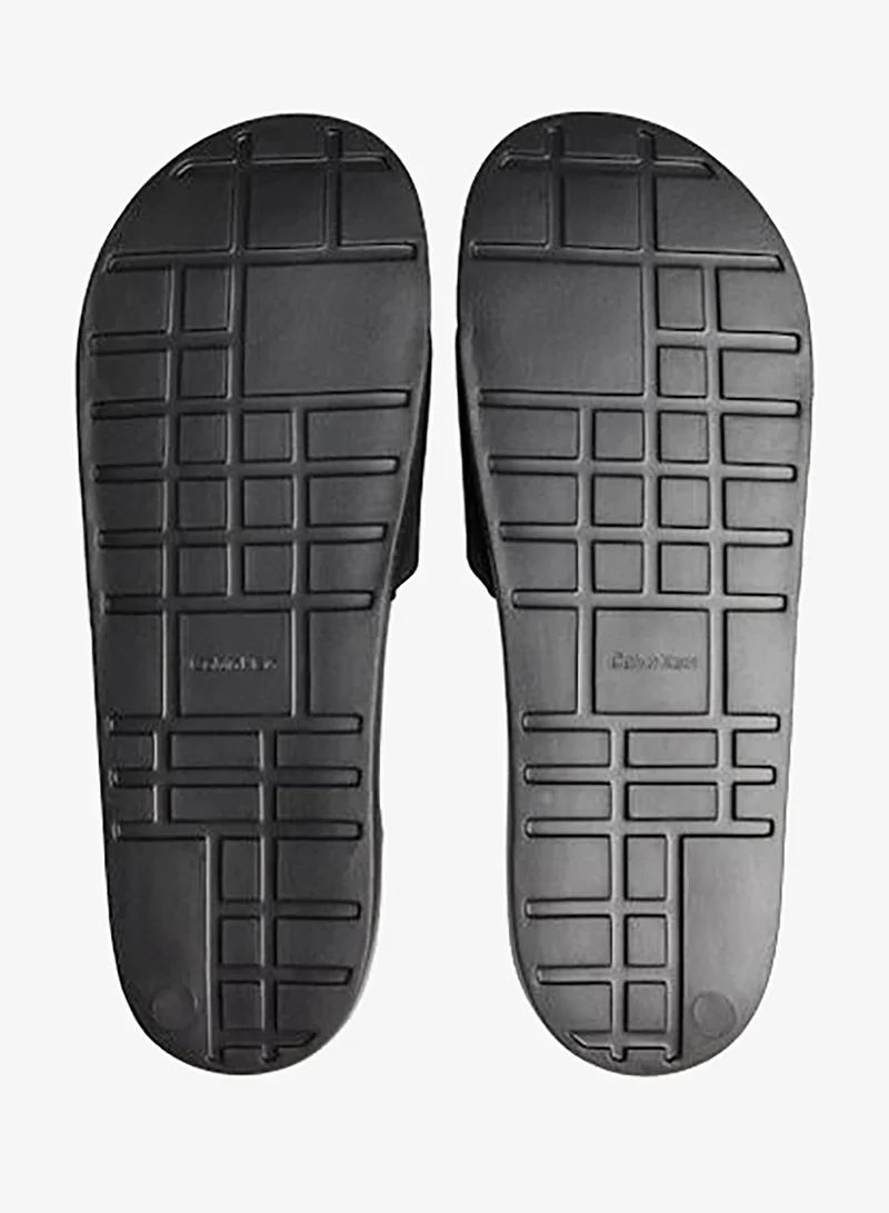 CALVIN KLEIN Triple Black Essential Monogram Canvas Slide Sandals for Men | Best Price UAE