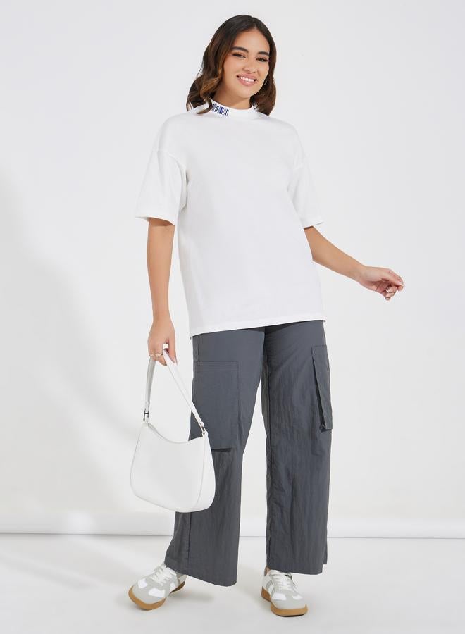 Styli Styli Oversized Slogan T-Shirt with High-Low Hem  - Image 2
