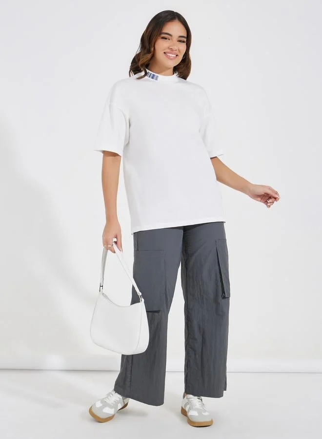 Styli Oversized Slogan T-Shirt with High-Low Hem