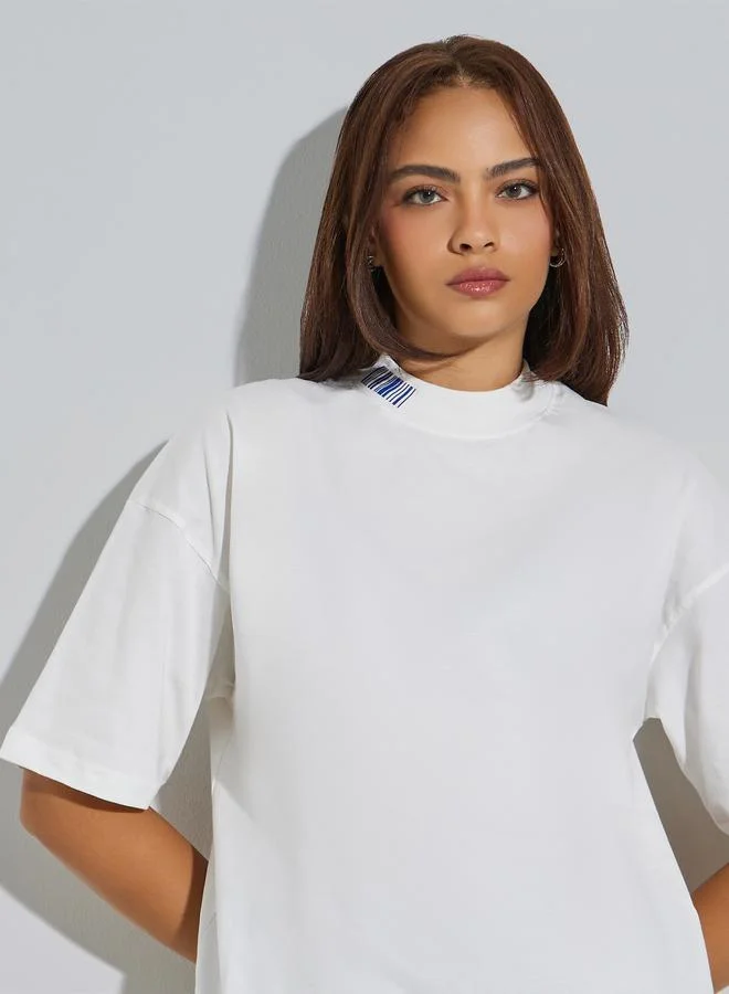 Styli Oversized Slogan T-Shirt With High-Low Hem