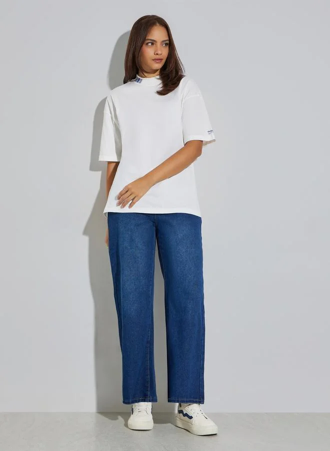 Styli Oversized Slogan T-Shirt With High-Low Hem
