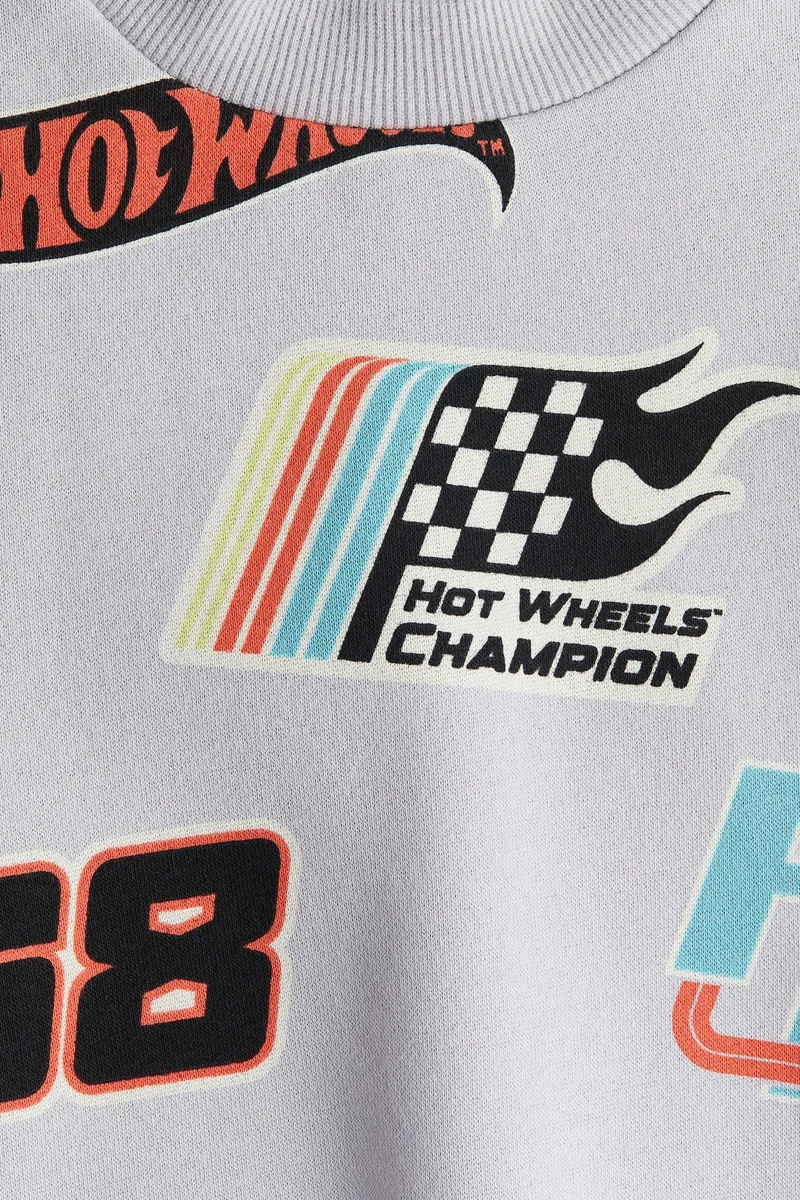 اتش اند ام سويت شيرت فضفاضة ذات طبعة