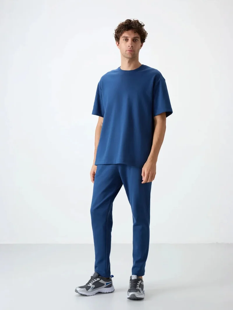 تومي لايف TOMMY Men's Oversized T-shirt And Pants Set