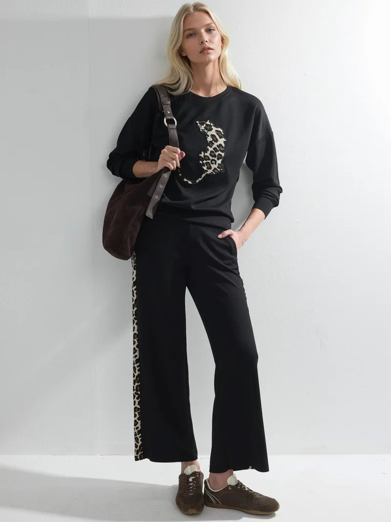 هيكاب طقم قطعتين بنقشة الفهد من مودال تاتش مجموعة بيرسان