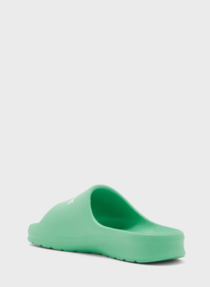 LACOSTE Serve Logo Slides
