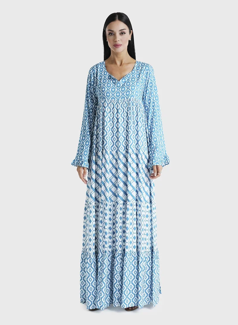 كشخة جلابية بنقوش هندسية باللون التركواز مع تطريز حجري من الرايون