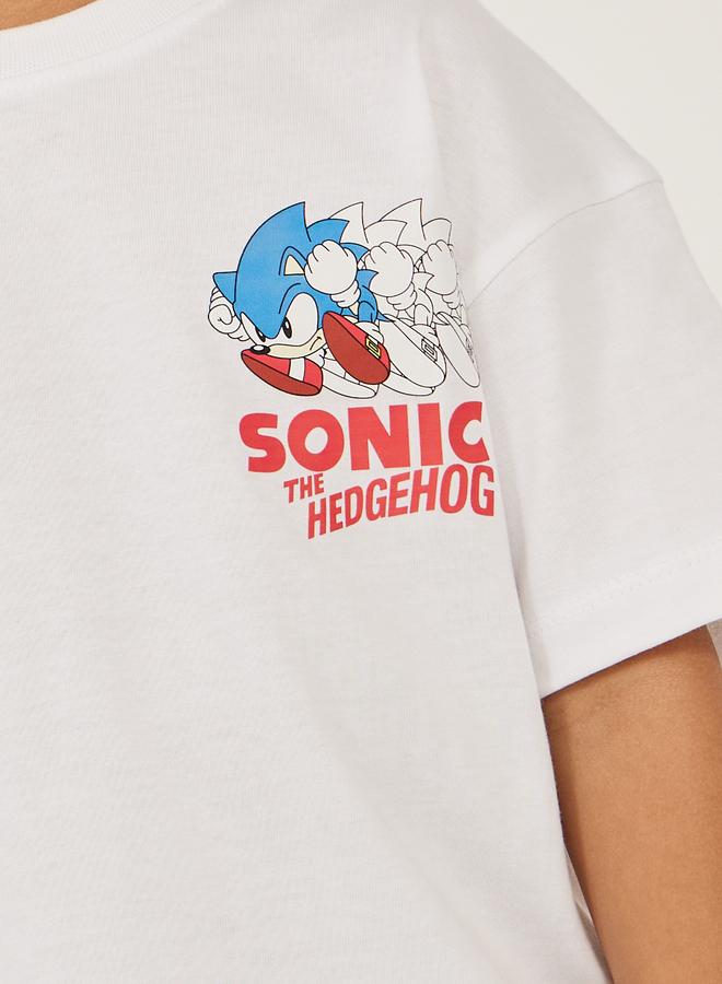 ستايلي تيشيرت فضفاض بطبعة جرافيك وأكتاف منخفضة - Image 4