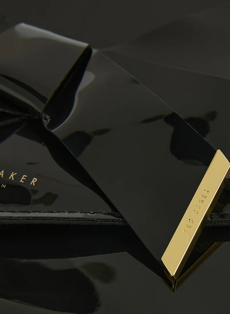 تيد بيكر حقيبة ظرف بعقدة فيونكة