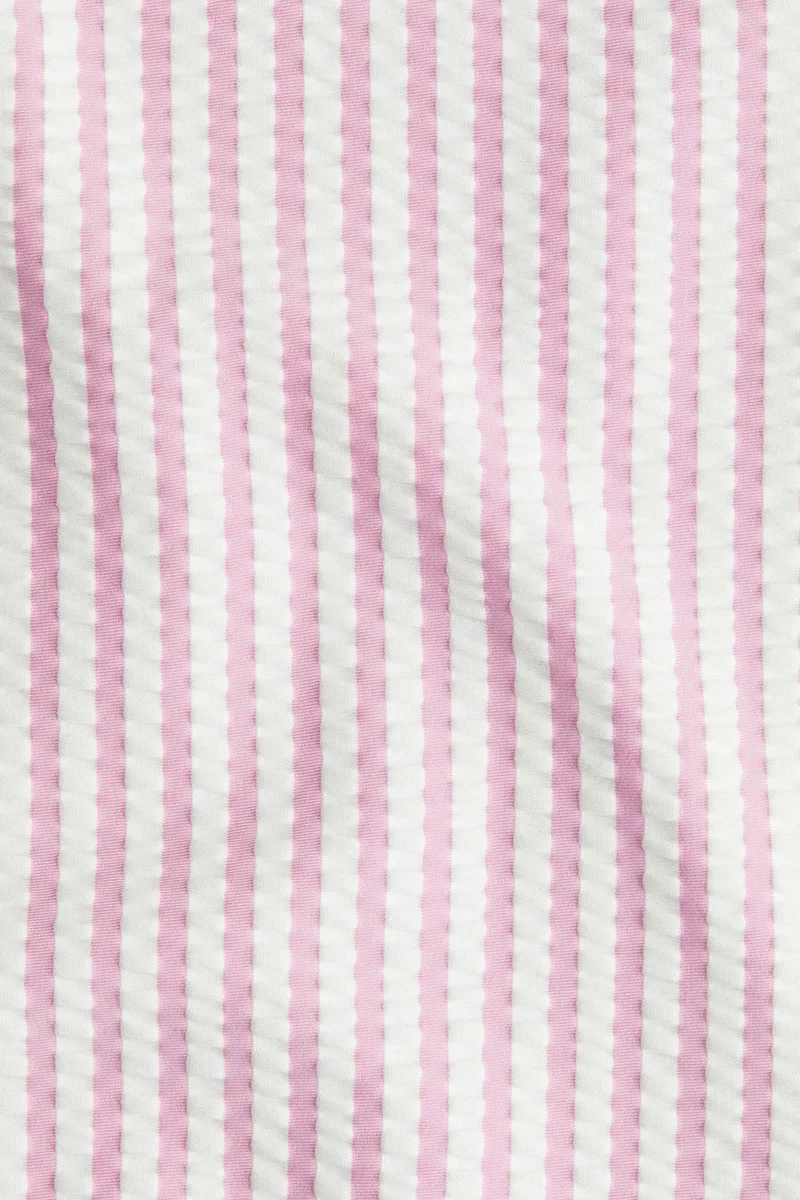 اتش اند ام توب سباحة للحماية من الشمس بمعيار 50