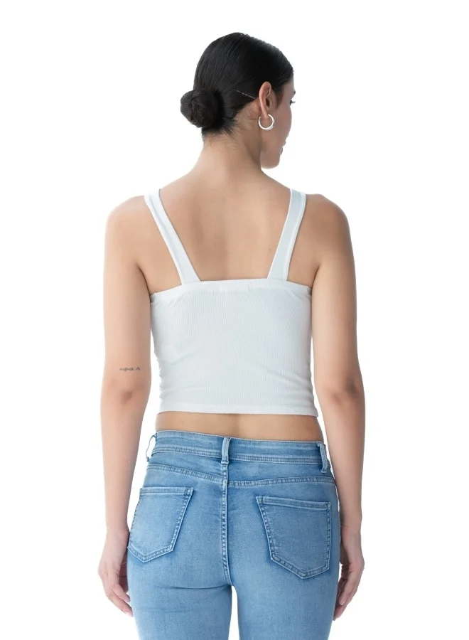 HaILYS Trendy white crop top with a unique cross-back design, perfect for summer wear.