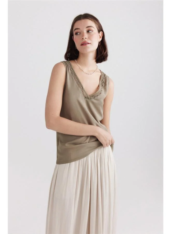 Springfield  Embroidered neckline vest top for Women | Best Price UAE