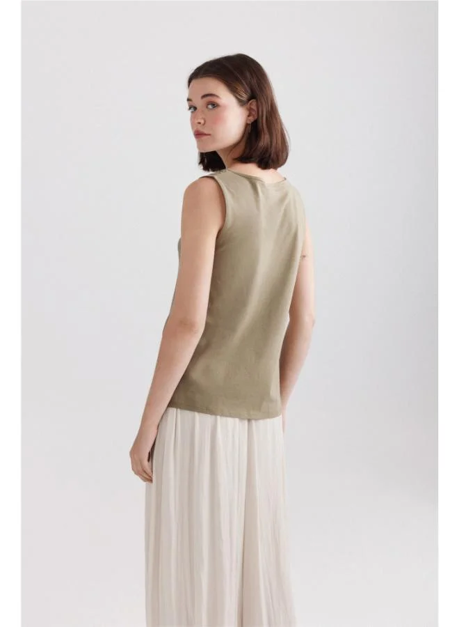Springfield  Embroidered neckline vest top for Women | Best Price UAE