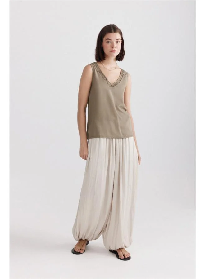 Embroidered neckline vest top