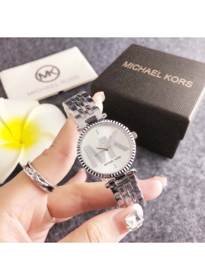 ام كي Michael Kors Women's Silver - Tone Watch with Signature Logo Dial and Stainless Steel Bracelet