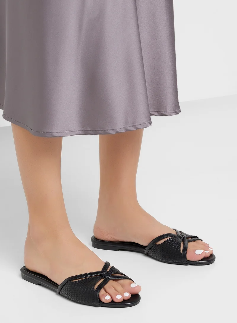 ايلا Strappy Weave Detail Flat Sandal
