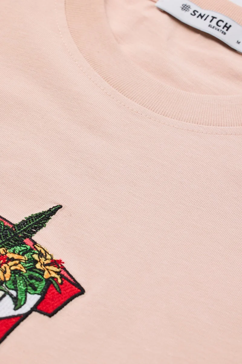 سنيتش تيشيرت بقصة ضيقة مطرز بالخوخ