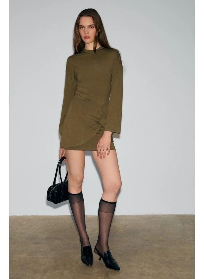 Grimelange SEVLEY Women's Soft and Stretchy Fabric Mini Khaki Dress with Round Neck and Tie Details.