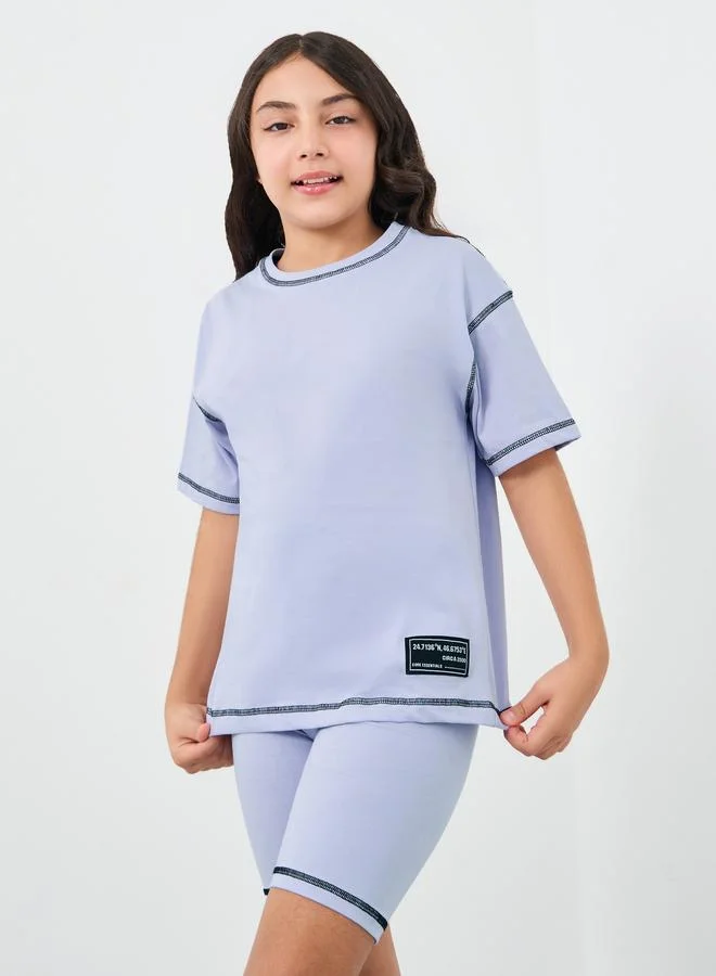 Styli Styli Girls Lilac Contrast Stitch Detail Oversized T-Shirt and Shorts Set