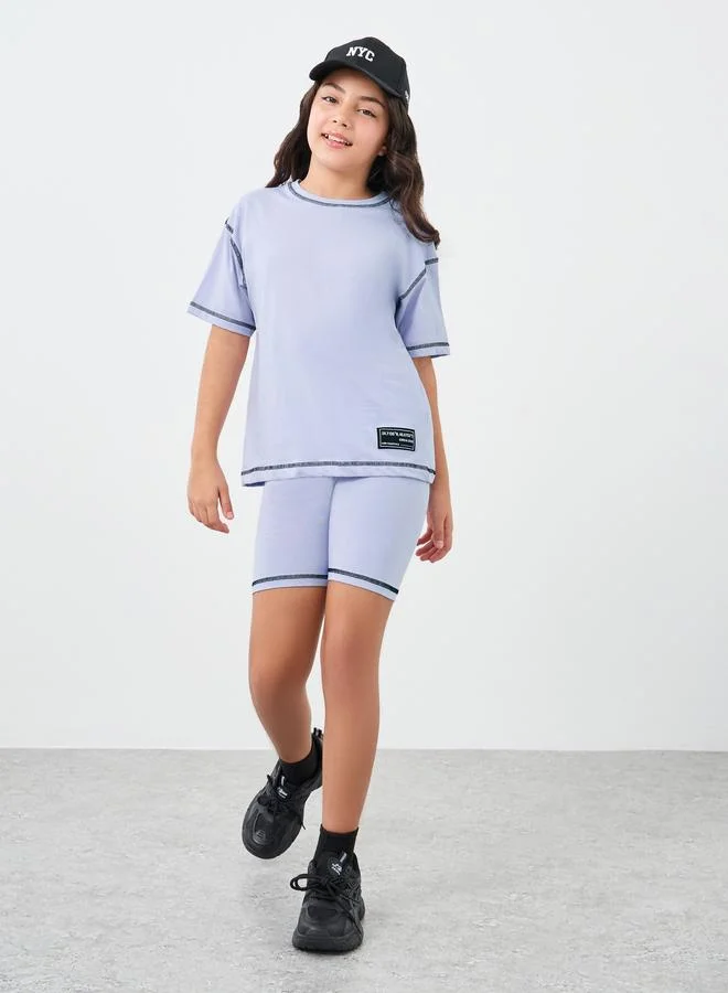 ستايلي Styli Girls Lilac Contrast Stitch Detail Oversized T-Shirt and Shorts Set