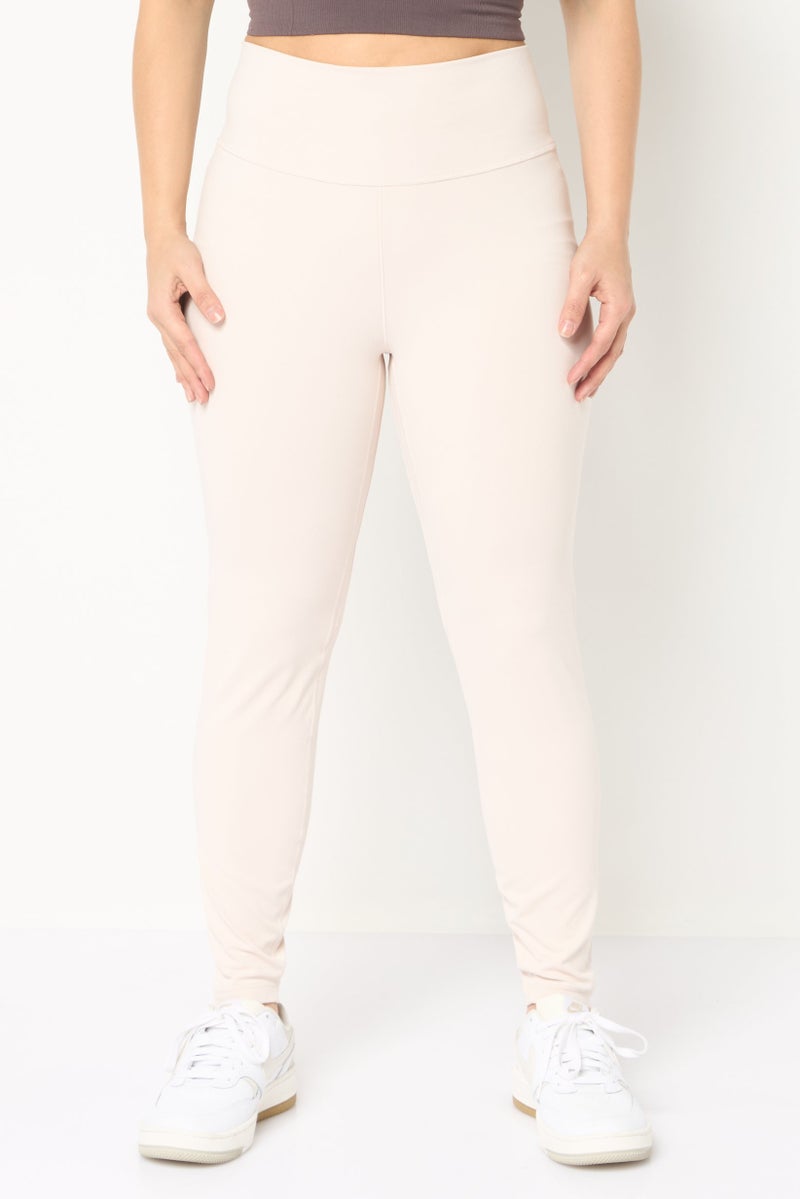 Adidas ليغينغز تدريب رياضية للنساء، كريمي - Image 1