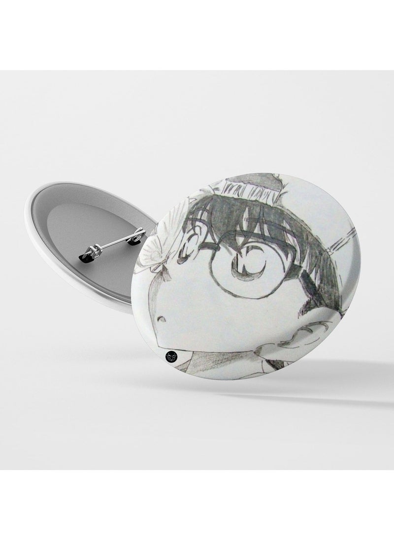 Reeman Design Brooch with Conan design printed on it 