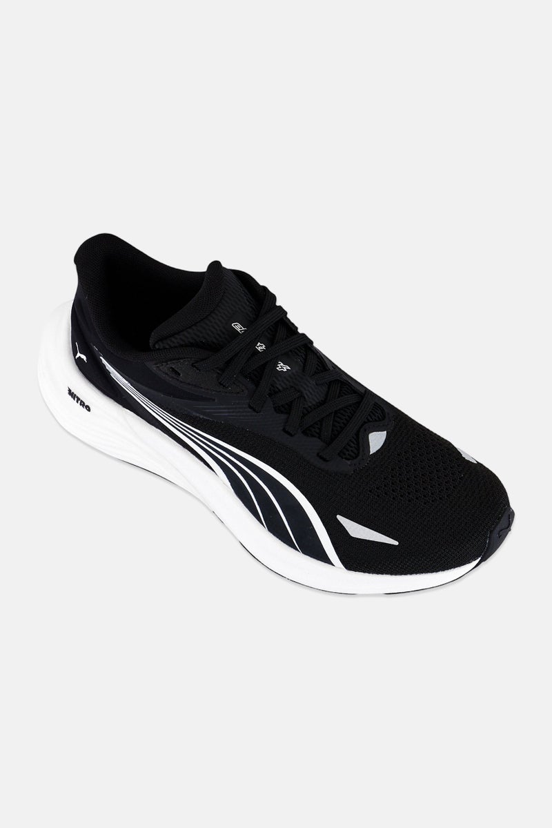 PUMA أحذية جري نسائية نيترو 4 كهربائية مزودة بأربطة، سوداء - Image 1
